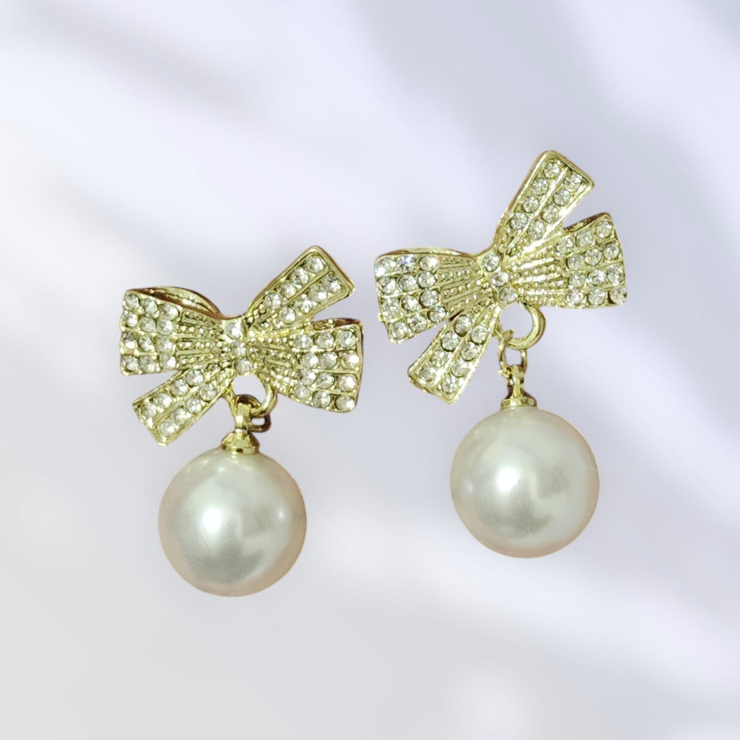 Pearl Drop Earrings with Crystal Bow – Classy & Elegant