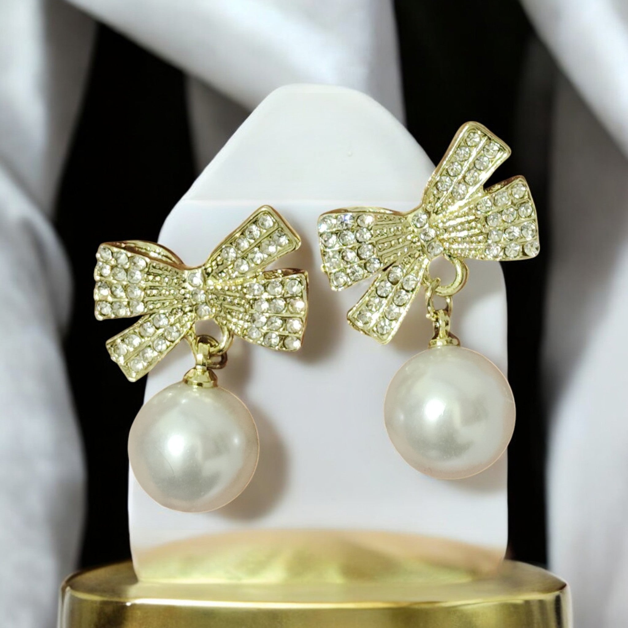 Pearl Drop Earrings with Crystal Bow – Classy & Elegant