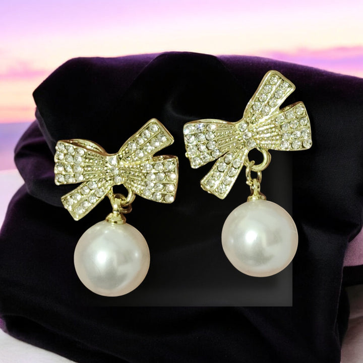Pearl Drop Earrings with Crystal Bow – Classy & Elegant