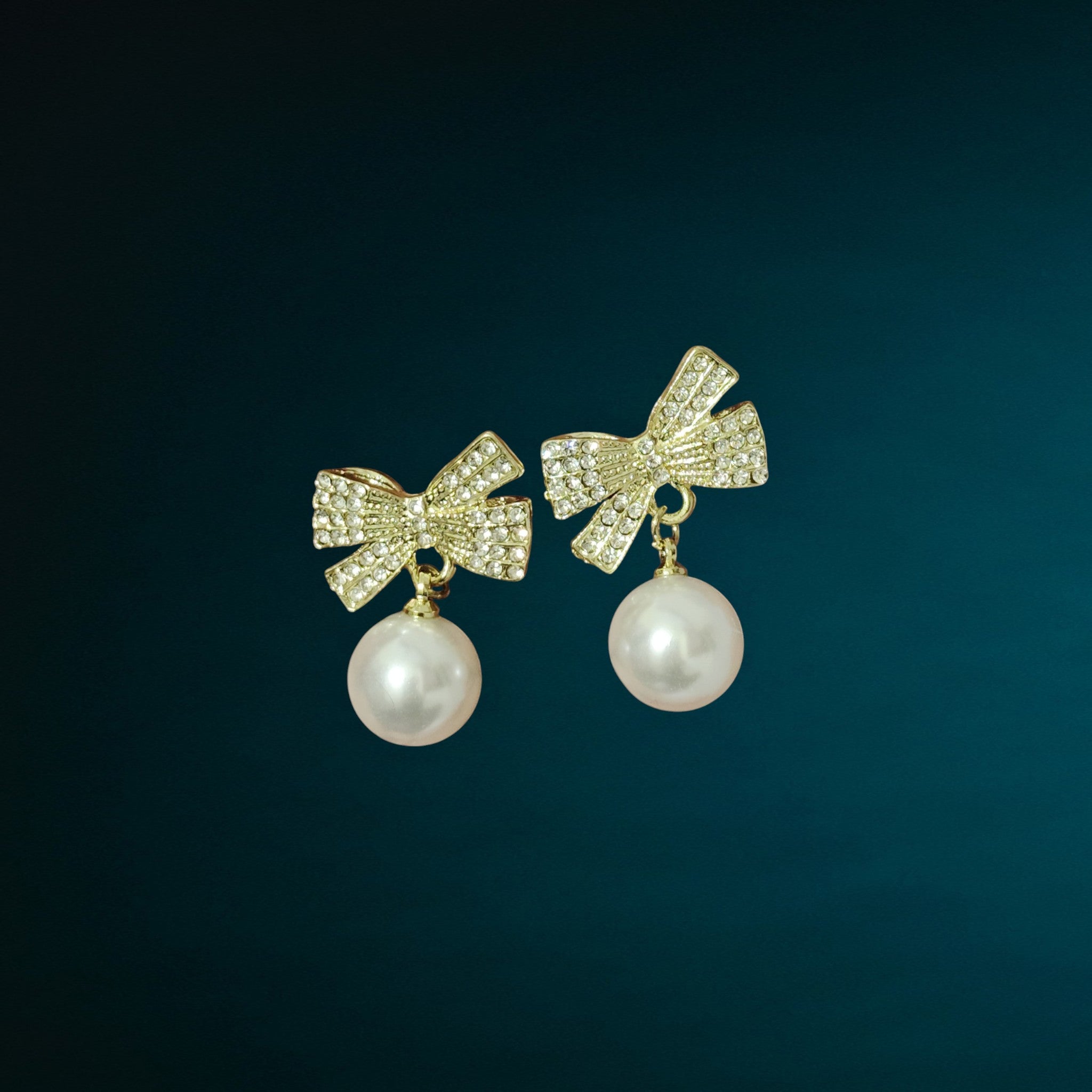 Pearl Drop Earrings with Crystal Bow – Classy & Elegant