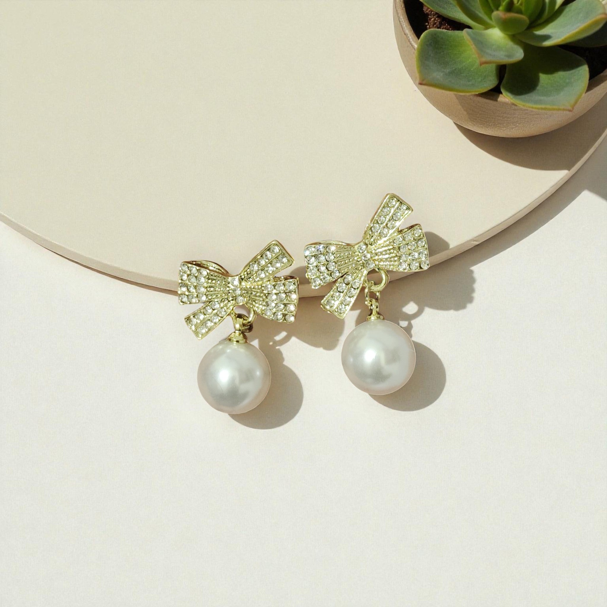 Pearl Drop Earrings with Crystal Bow – Classy & Elegant