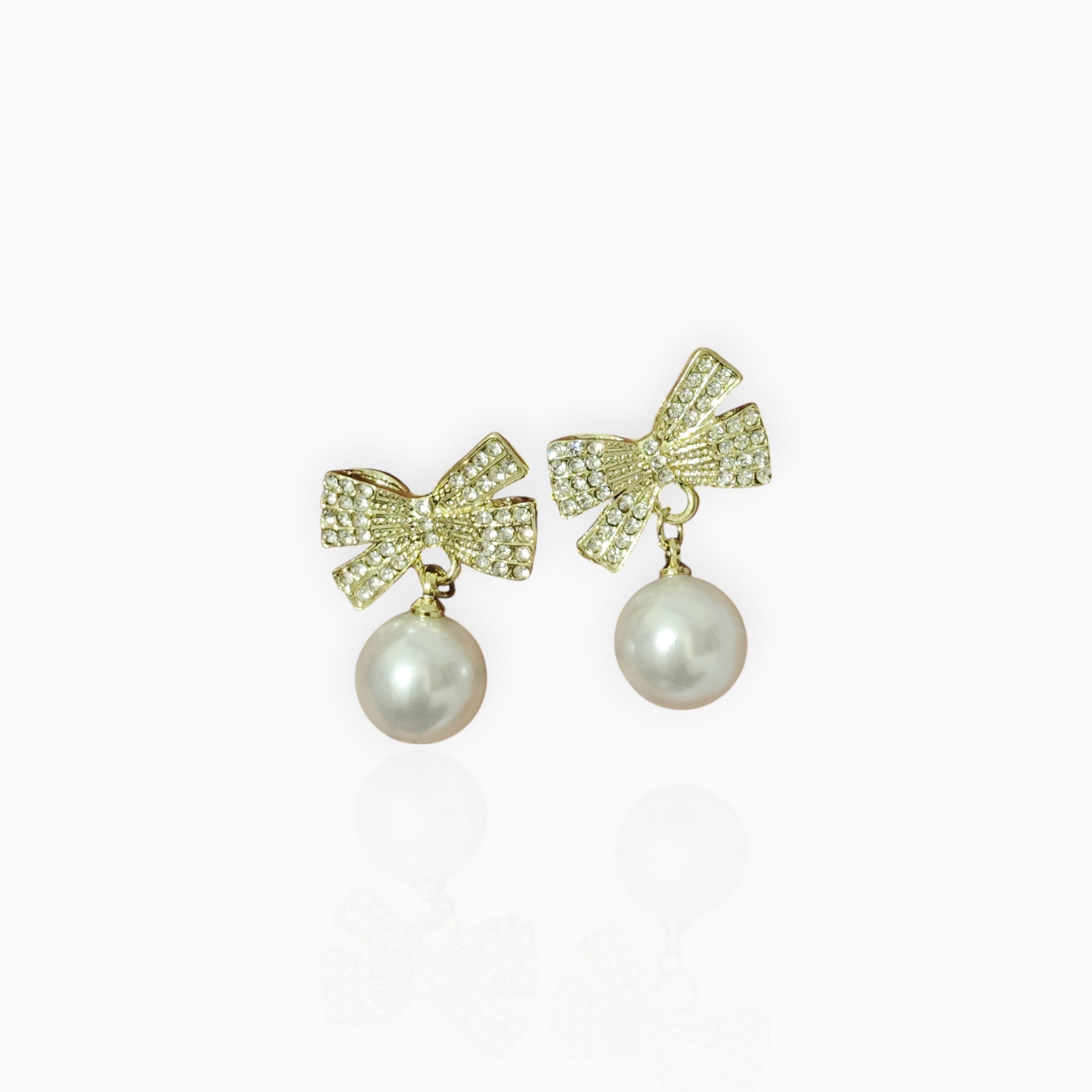 Pearl Drop Earrings with Crystal Bow – Classy & Elegant